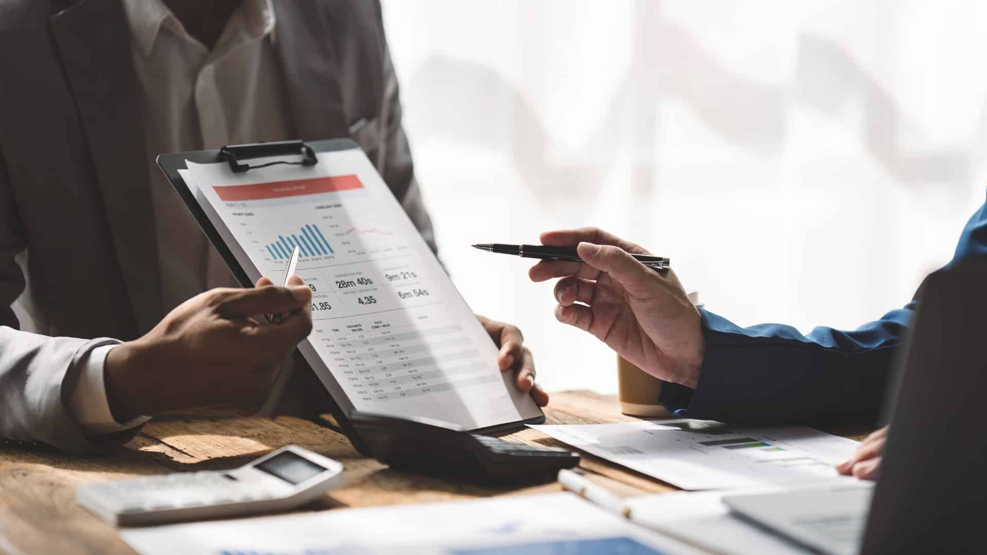 Financial report on a clipboard for property accounting review