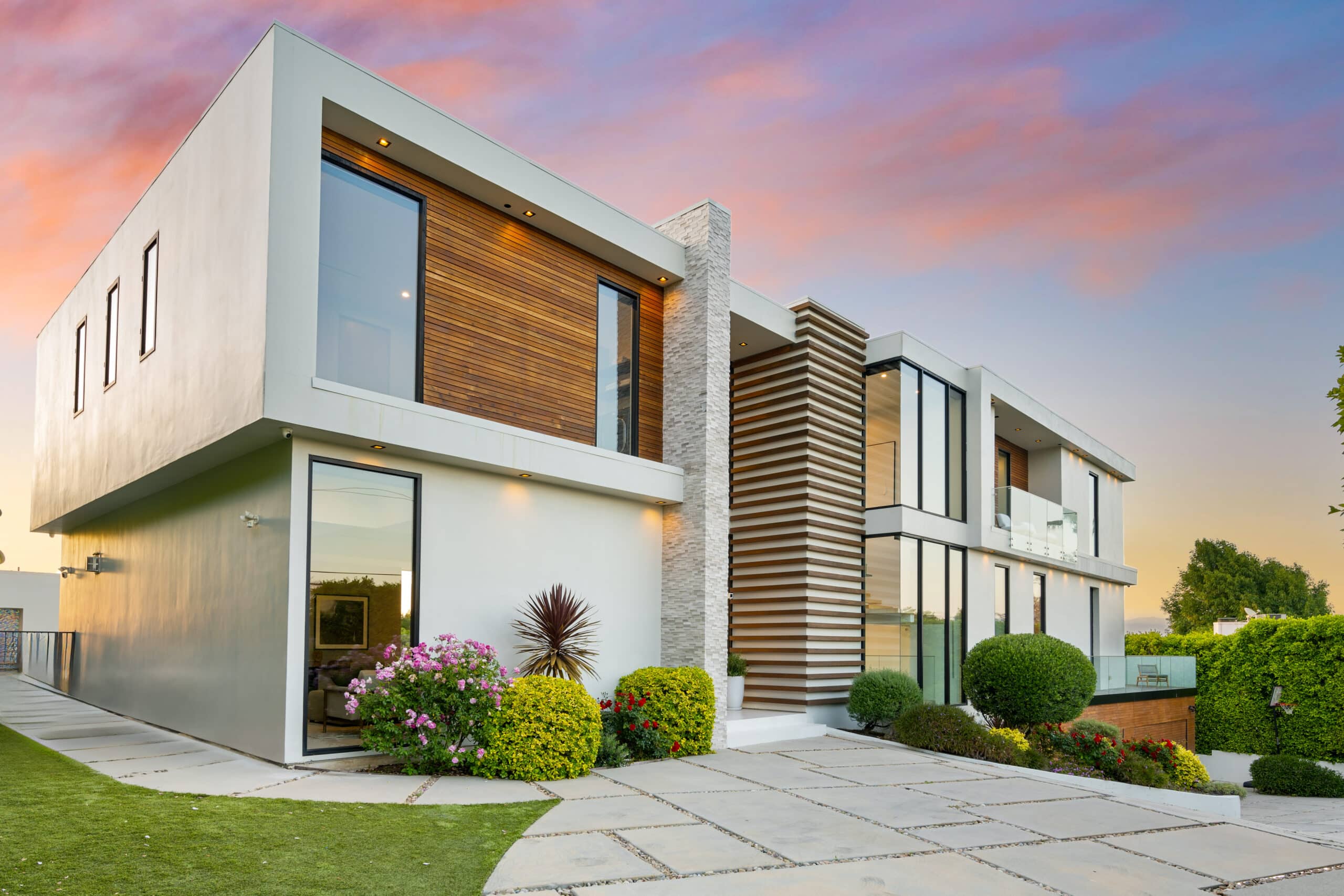 Contemporary rental home exterior with a landscaped front yard