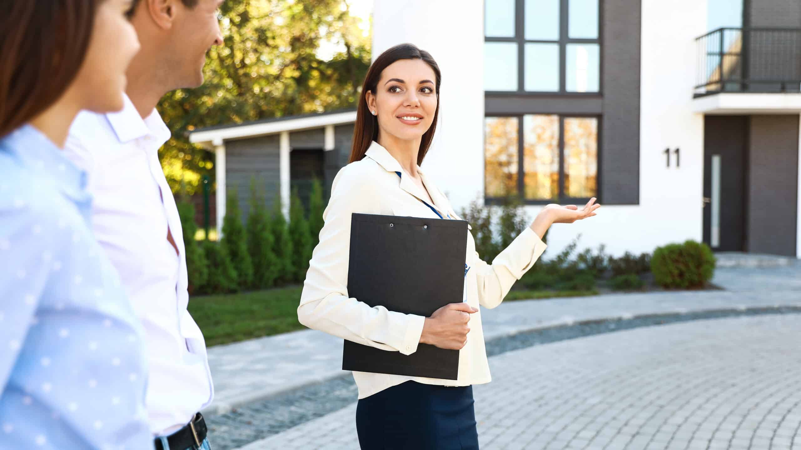 Property manager reviewing a rental application with a prospective tenant