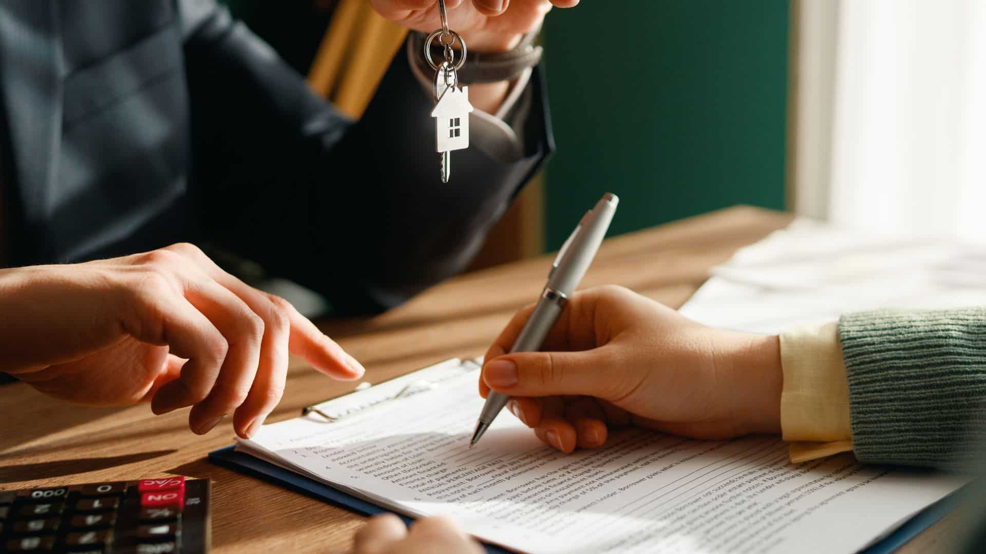 New tenant signing a lease during the leasing process